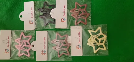 گیره مو دخترانه مدل تق تقی ستاره ای پاستیلی بسته 10 عددی