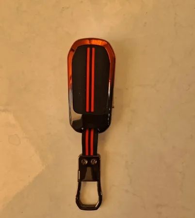 کاور ریموت و سوئیچ خودرو ام آر جی مدل A1111 طرح فلز گرادیانی مناسب برای تارا دستی