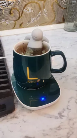 ماگ حرارتی لاکی طرح هیتردار به همراه صفحه گرمکن