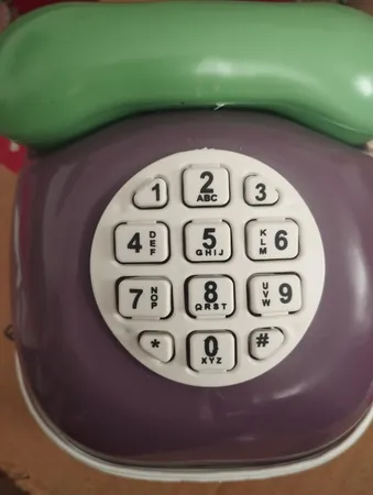 قلک طرح اسباب بازی تلفن و ماشین