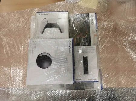 کنسول بازی سونی مدل PlayStation 5 ظرفیت 825 گیگابایت ریجن 1200 آسیا به همراه دسته اضافی و پایه شارژر و هدست