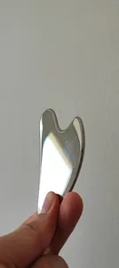 تجریه خرید ماساژور دستی صورت مدل گوآشا استیل