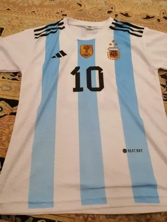 ست پیراهن و شورت ورزشی پسرانه طرح آرژانتین مدل مسی 2023