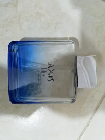 ادو تویلت مردانه اکسیس مدل Blue حجم 90 میلی لیتر