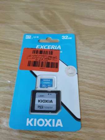 کارت حافظه‌ microSDHC کیوکسیا مدل EXCERIA کلاس 10 استاندارد UHS-I U1 سرعت 100MBps ظرفیت 32 گیگابایت به همراه آداپتور SD
