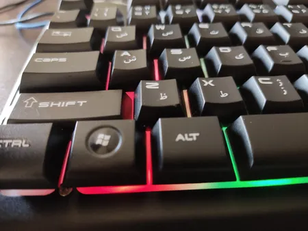 کیبورد گیمینگ تسکو مدل TK 8021L با حروف فارسی، سوییچ ممبران، Full-Size، نورپردازی RGB LED