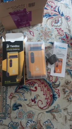 ماشین اصلاح موی صورت یاندو مدل SV-316U به همراه تیغه و توری یدک