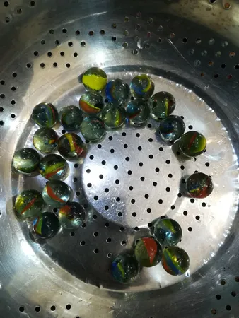 تیله مدل R25 رنگی بسته 25 عددی