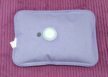 کیسه آب گرم برقی مدل warm dot