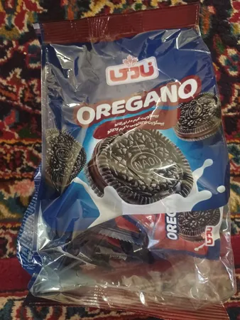 بیسکویت کرم دار کاکائویی اورگانو با مغزی شکلاتی نادی - 250 گرم