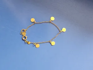 تجریه خرید دستبند طلا 18 عیار زنانه طلای مستجابی مدل پولکی کد 20 به همراه 50 سوت هدیه طلا