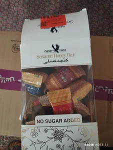 تجریه خرید کنجد عسلی پذیرایی عقاب 10 گرم بسته 32 عددی