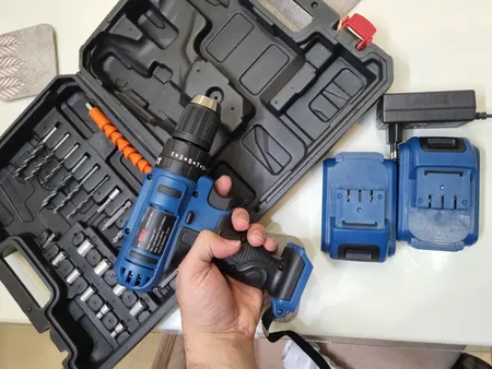 دریل شارژی چکشی باس مدل SK-6050 مجموعه 28 عددی