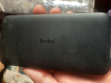 پاوربانک 10 وات شیائومی مدل Redmi ظرفیت 10000 میلی آمپر ساعت به همراه کابل تبدیل microUSB