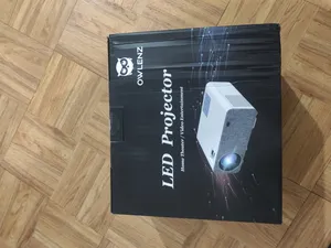 تجریه خرید ویدئو پروژکتور النز مدل SD500 Smart Android به همراه پرده نمایش و دو کنترل