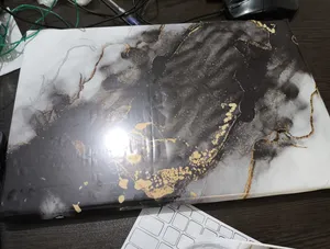 تجریه خرید استیکر لپ تاپ راتیانا مدل marble 21 مناسب برای لپ تاپ 15 تا 17 اینچ به همراه برچسب حروف فارسی کیبورد