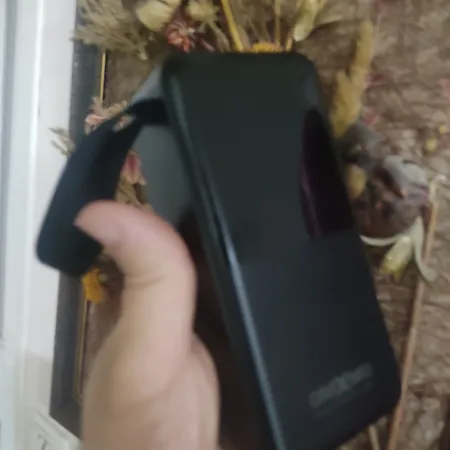 پاوربانک مدل 0MXM0 ظرفیت 30000 میلی آمپر ساعت