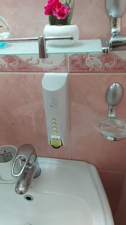 پایه رول دستمال کاغذی بنتی مدل دکورال به همراه جا مایع