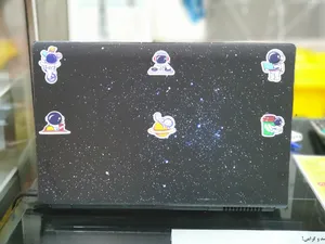 تجریه خرید استیکر لپ تاپ توییجین و موییجین طرح Space  کد 182 مناسب برای لپ تاپ 15.6 اینچ به همراه برچسب حروف فارسی کیبورد