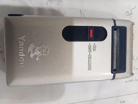 ماشین اصلاح موی صورت یاندو مدل Sv-w301u به همراه تیغه و توری یدک