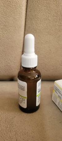 سرم روشن کننده پوست تیلسیم مدل کافئین و آلفا آربوتین مناسب برای انواع پوست حجم 30 میلی‌لیتر