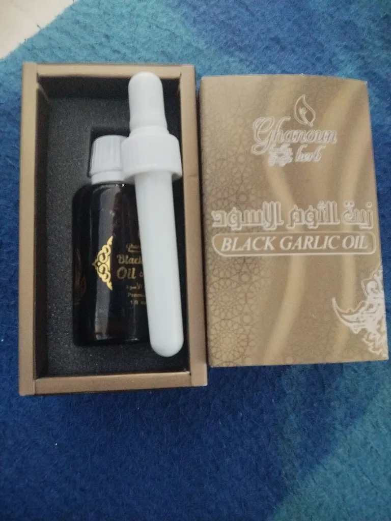 سرم مو قانون مدل سیر سیاه حجم 30 میلی لیتر