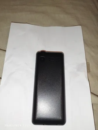 گوشی موبایل جی ال ایکس مدل iT5606 دو سیم کارت ظرفیت 32 مگابایت و رم 32 مگابایت