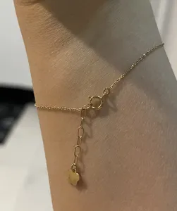 تجریه خرید دستبند زنجیری طلا 18 عیار زنانه الی گالری مدل بال