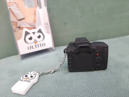 فلش مموری طرح دوربین عکاسی نیکون مدل Ultita -CN01 ظرفیت 32 گیگابایت