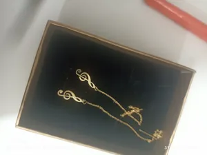 تجریه خرید گوشواره طلا 18 عیار ماهک مدل ME0562 طرح نت سل موسیقی