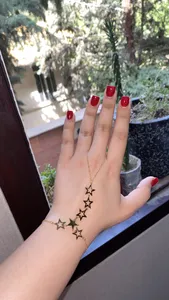 تجریه خرید دستبند طلا 18 عیار زنانه طلای مستجابی مدل تمیمه ستاره کد 6758