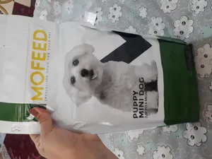 تجریه خرید غذای خشک سگ مفید مدل PUPPY Mini Junior BM وزن 2000 گرم
