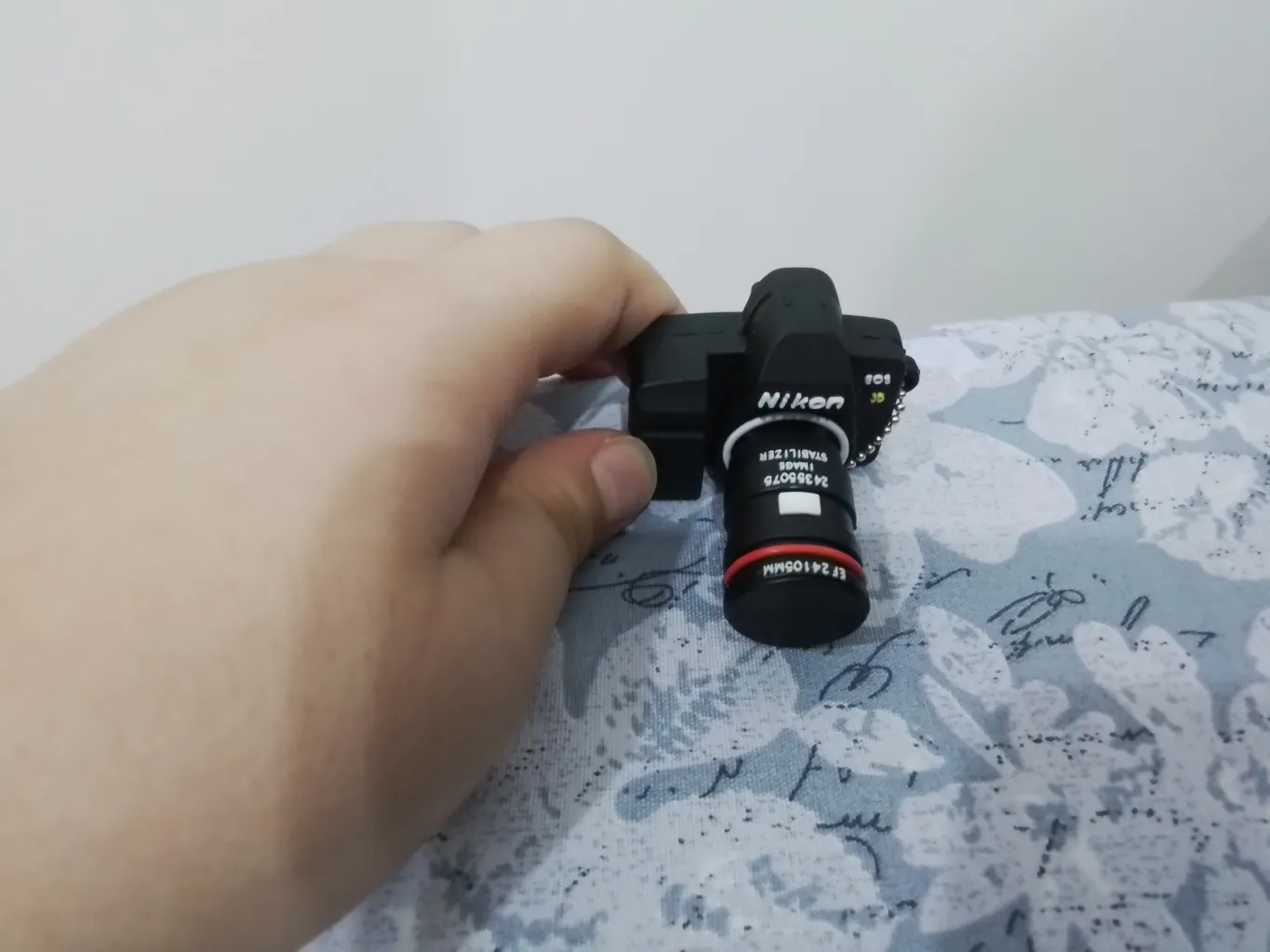 فلش مموری طرح دوربین عکاسی نیکون مدل Ul-CN02 ظرفیت 64 گیگابایت