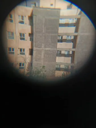 دوربین دوچشمی کومت مدل 100X25