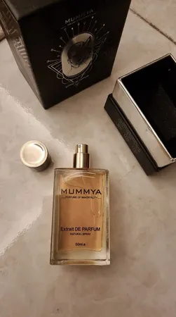 اکستریت پرفیوم مردانه مومیا مدل مارلی لیتون با رایحه گرم حجم 50 میلی لیتر
