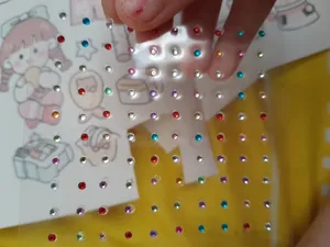 تجریه خرید پیرسینگ بینی زنانه مدل نگین چسبی بسته 100عددی