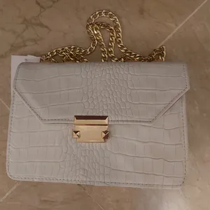 تجریه خرید کیف دوشی زنانه چرم آرا مدل d099 کد K