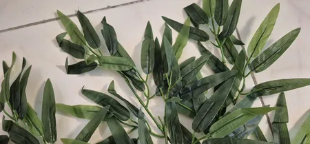 گل مصنوعی مدل بوته برگ بامبو لمسی بسته 12 عددی