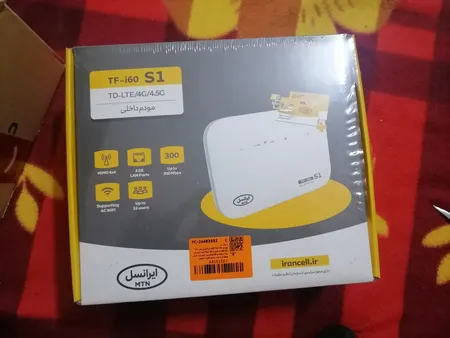 مودم 4G/TD-LTE ایرانسل مدل TF-i60 S1 به همراه 24 گیگابایت اینترنت سه ماهه و 60 گیگابایت اینترنت شش ماهه و 1 عدد سیم کارت دائمی طلایی