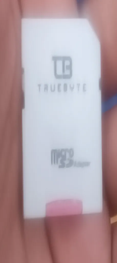 کارت حافظه microSDXC تروبایت مدل 633X-A2-V30 کلاس 10 استاندارد UHS-I U3 سرعت 95MBps ظرفیت 64 گیگابایت به همراه کارت‌خوان