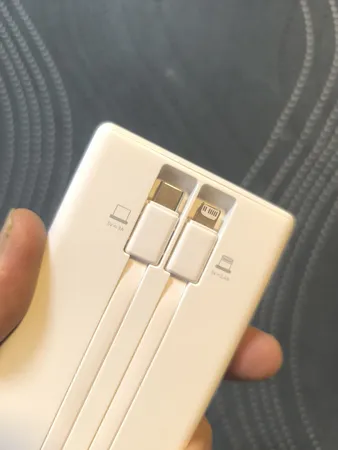 پاوربانک 15 وات رامووس مدل 141 ظرفیت 10000 میلی آمپر ساعت