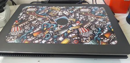 استیکر لپ تاپ راتیانا مدل cinema01 مناسب برای لپ تاپ 15 تا 17 اینچ به همراه برچسب حروف فارسی کیبورد