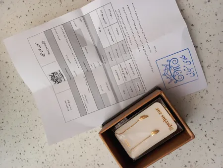 گوشواره طلا 18 عیار زنانه طلای مستجابی مدل بخیه ای پر کد 670175