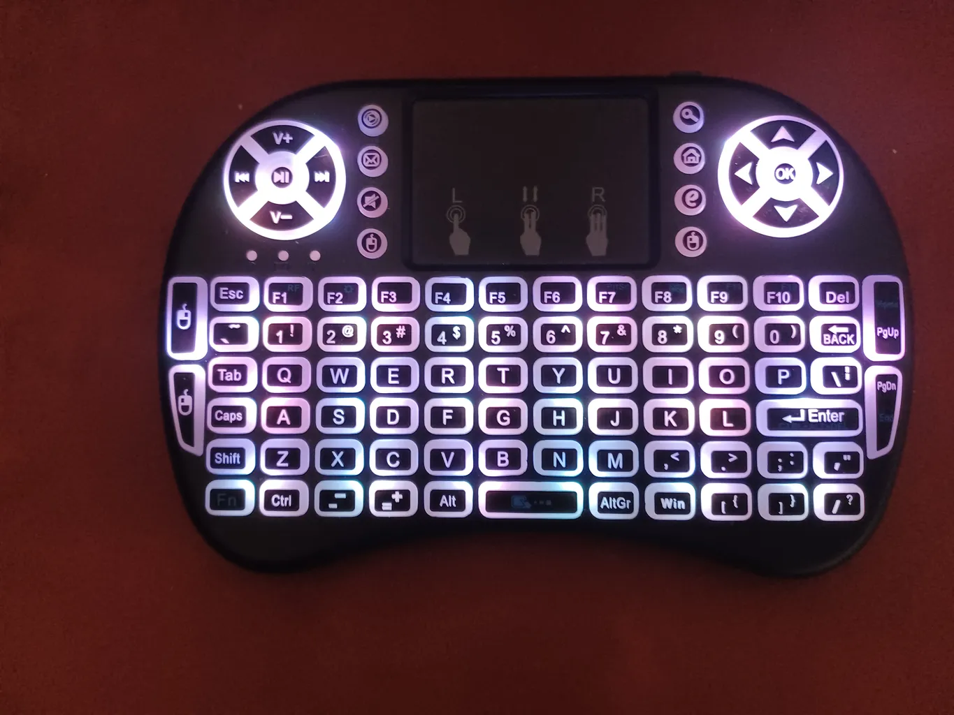 مینی کیبورد بی سیم مدل i8 Backlit، دارای تاچ پد، دارای نورپردازی تک رنگ مینی کیبورد بی سیم مدل i8 Backlit، دارای تاچ پد، دارای نورپردازی تک رنگ
