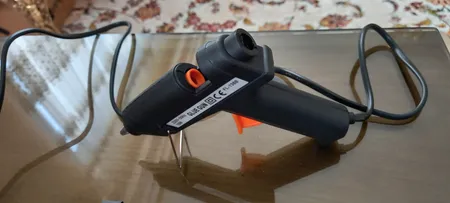 دستگاه چسب تفنگی جانسون مدل FL-138B به همراه یک عدد چسب حرارتی جانسون بصورت رایگان