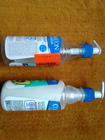 کرم مرطوب‌کننده کامان مدل Oil Pluse حجم 400 میلی‌لیتر