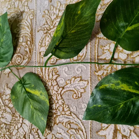 گل مصنوعی مدل ریسه برگ طرح پتوس کد 90 بسته 5 عددی