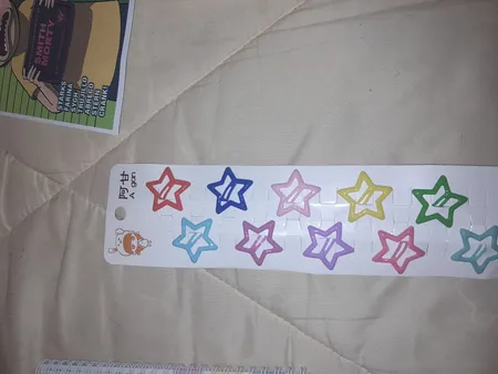 گیره مو دخترانه مدل تق تقی ستاره ای پاستیلی بسته 10 عددی