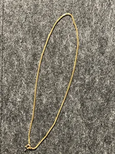 تجریه خرید گردنبند طلا کم اجرت 18 عیار زنانه با طرح بیزمارک ناریا مدل لوکس