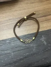 تجریه خرید دستبند طلا 18 عیار زنانه مدل قلب و بی نهايت